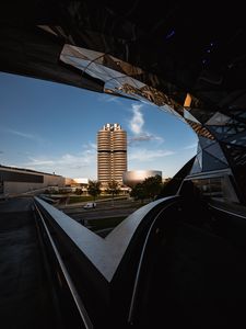 Preview wallpaper buildings, architecture, roof, road, bmw, car