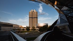 Preview wallpaper buildings, architecture, roof, road, bmw, car