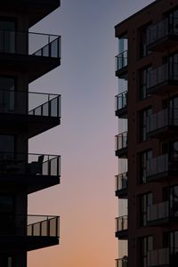 Preview wallpaper buildings, balconies, sunset, sky