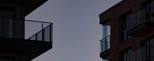 Preview wallpaper buildings, balconies, sunset, sky