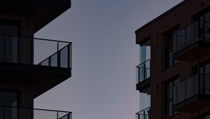 Preview wallpaper buildings, balconies, sunset, sky