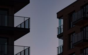 Preview wallpaper buildings, balconies, sunset, sky