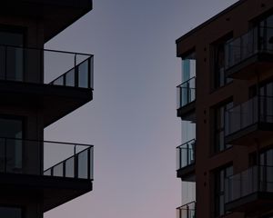 Preview wallpaper buildings, balconies, sunset, sky