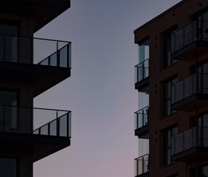 Preview wallpaper buildings, balconies, sunset, sky