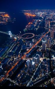 Preview wallpaper buildings, bridges, lights, channel, night, city, aerial view