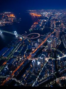 Preview wallpaper buildings, bridges, lights, channel, night, city, aerial view