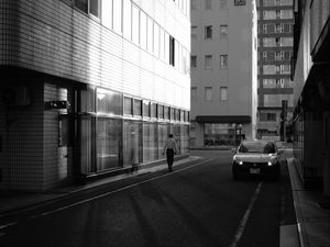 Preview wallpaper buildings, bw, street, man, city