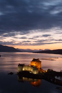 Preview wallpaper buildings, castle, island, sea, evening