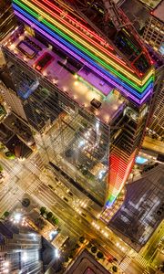 Preview wallpaper buildings, city, aerial view, colorful, backlight