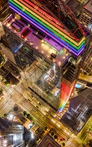 Preview wallpaper buildings, city, aerial view, colorful, backlight