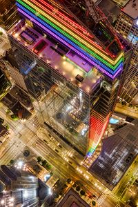 Preview wallpaper buildings, city, aerial view, colorful, backlight