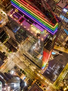 Preview wallpaper buildings, city, aerial view, colorful, backlight