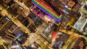 Preview wallpaper buildings, city, aerial view, colorful, backlight