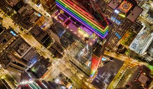 Preview wallpaper buildings, city, aerial view, colorful, backlight