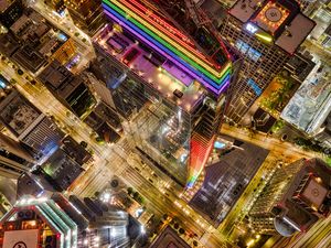 Preview wallpaper buildings, city, aerial view, colorful, backlight
