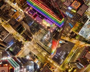 Preview wallpaper buildings, city, aerial view, colorful, backlight