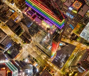 Preview wallpaper buildings, city, aerial view, colorful, backlight