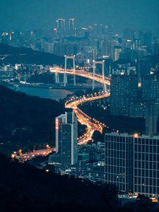 Preview wallpaper buildings, city, aerial view, road, bridge, night, fog