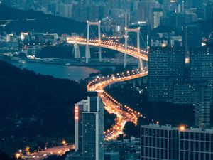 Preview wallpaper buildings, city, aerial view, road, bridge, night, fog