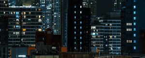 Preview wallpaper buildings, city, aerial view, skyscrapers, night, architecture