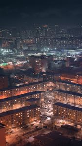 Preview wallpaper buildings, city, aerial view, night, snow