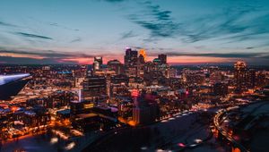 Preview wallpaper buildings, city, aerial view, night, lights, glow, dark