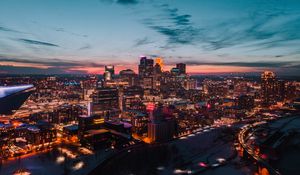 Preview wallpaper buildings, city, aerial view, night, lights, glow, dark