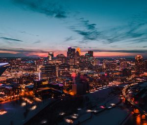 Preview wallpaper buildings, city, aerial view, night, lights, glow, dark