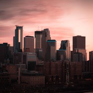 Preview wallpaper buildings, city, aerial view, sunset, dusk