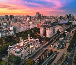 Preview wallpaper buildings, city, architecture, road, sunset