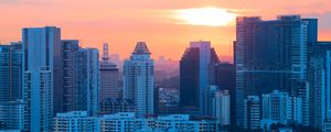 Preview wallpaper buildings, city, architecture, evening, sunset