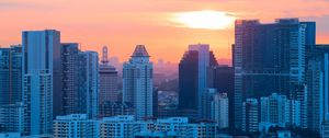 Preview wallpaper buildings, city, architecture, evening, sunset
