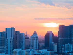 Preview wallpaper buildings, city, architecture, evening, sunset