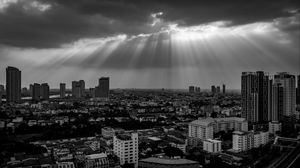 Preview wallpaper buildings, city, black and white, sky, sunlight
