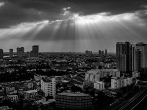 Preview wallpaper buildings, city, black and white, sky, sunlight