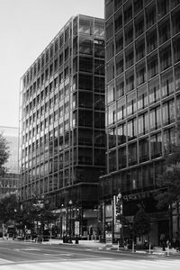 Preview wallpaper buildings, city, car, trees, street, bw