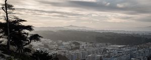 Preview wallpaper buildings, city, mountains, clouds