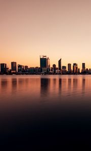 Preview wallpaper buildings, city, reflection, water, sky, twilight