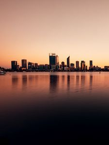 Preview wallpaper buildings, city, reflection, water, sky, twilight
