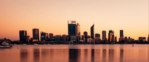 Preview wallpaper buildings, city, reflection, water, sky, twilight