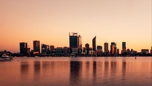 Preview wallpaper buildings, city, reflection, water, sky, twilight
