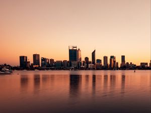Preview wallpaper buildings, city, reflection, water, sky, twilight