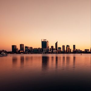 Preview wallpaper buildings, city, reflection, water, sky, twilight