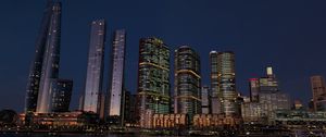 Preview wallpaper buildings, city, river, bridge, evening, night, dark