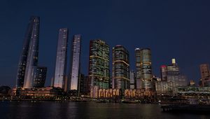 Preview wallpaper buildings, city, river, bridge, evening, night, dark