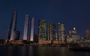 Preview wallpaper buildings, city, river, bridge, evening, night, dark