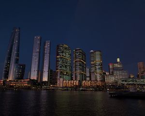 Preview wallpaper buildings, city, river, bridge, evening, night, dark