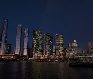 Preview wallpaper buildings, city, river, bridge, evening, night, dark