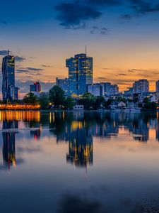 Preview wallpaper buildings, city, river, reflection, evening