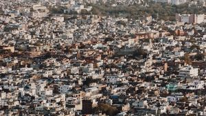 Preview wallpaper buildings, city, roofs, aerial view